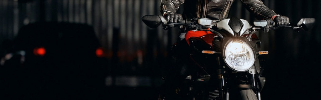 Dark image of motorcycle close up